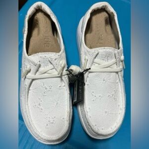 Women’s white Hey Dude shoes